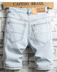 Men's Light Blue Distressed Knee-Length Denim Shorts